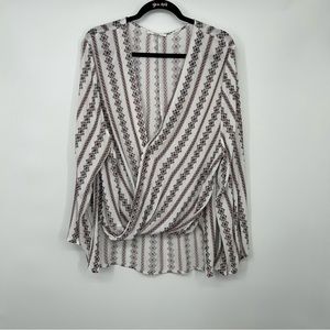 Into  draped black, white, and red printed flowy blouse size 10 NWOT